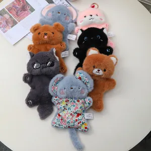 Variety of cute plush animal pendants in soft colors, ideal as keychains or hand warmers
