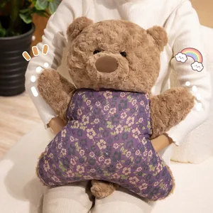 Cute brown teddy bear plush pillow with purple floral outfit, soft soothing doll gift