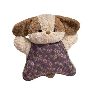 Cute brown and cream puppy plush toy wearing a purple floral outfit soothing pillow