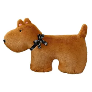 Cute brown plush puppy dog toy with a black polka dot bow tie, soft stuffed animal pillow