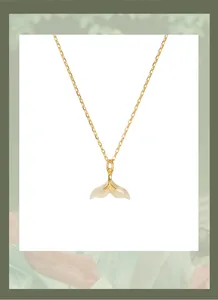 Detailed view of a S925 silver necklace featuring an elegant jade fish tail pendant design