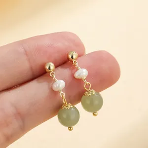 Elegant natural Hetian jade drop earrings with pearls and gold-plated studs for women.
