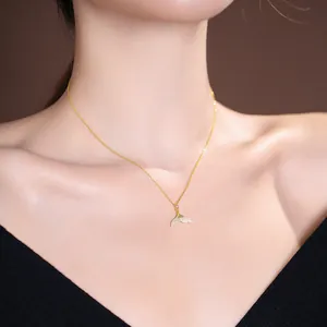 Elegant S925 sterling silver necklace featuring a dainty Hetian jade fishtail pendant