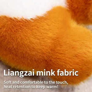 Detailed macro shot of high-quality orange and white soft faux mink plush fabric for warm winter slippers