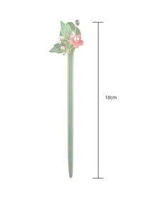 Vista dettagliata di un'elegante forcina cinese in acrilico da 18 cm con fiore