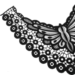 Close-up of black butterfly embroidered lace collar on organza base