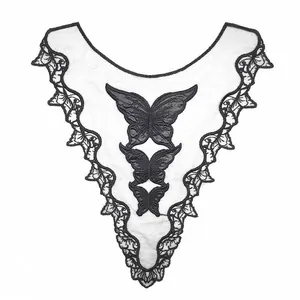 Macro detail of elegant black butterfly embroidery on white mesh water-soluble lace collar