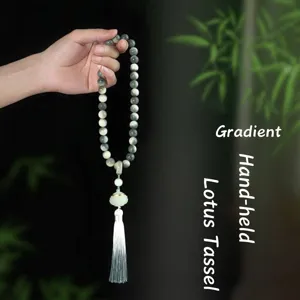 Elegant handheld Bodhi lotus prayer beads mala featuring gradient color and tassel