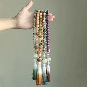 Elegant handheld Bodhi lotus beaded bracelet with gradient tassels in Chinese cultural style