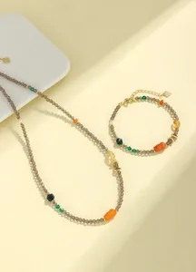 Elegante conjunto de joyas de cuarzo ahumado de 3mm con dijes de jade de seda dorada