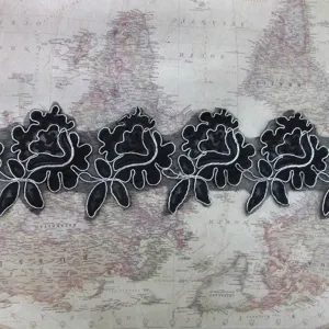 Black corded water-soluble lace trim with floral embroidery for DIY sewing projects