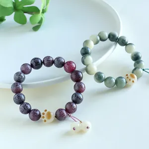 Handmade natural Bodhi seed bracelet with Six-Word Mantra engraving and cute cat paw charm