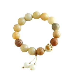 Handmade carbonized bodhi seed bracelet with cute cat paw charm and carved beads