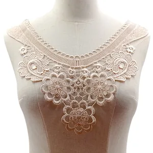 Detailed macro view of cream water-soluble lace floral embroidery fake collar on mannequin