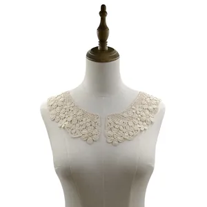 Detailed macro view of off-white floral water-soluble lace collar for DIY clothing