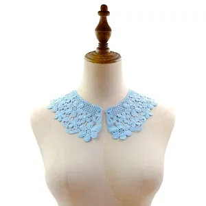 Close-up of light blue water-soluble lace floral collar accessory on mannequin for DIY sewing