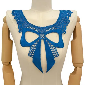 Detailed view of a blue water-soluble lace fake collar with bowknot embroidery design