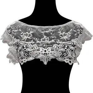 Detailed white water-soluble lace collar embroidery on black mannequin bust