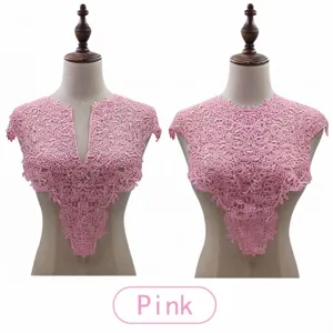 Detailed view of pink water-soluble lace collar with intricate floral embroidery design.