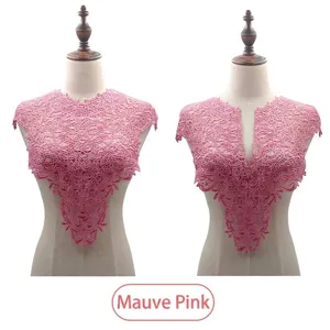Detailed view of elegant dusty pink water-soluble lace collar displayed on mannequins.