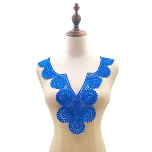 Close-up of bright blue water-soluble lace V-neck collar applique on a mannequin