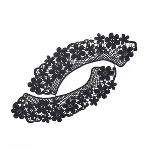 Detailed macro view of black floral water-soluble lace embroidery applique for DIY