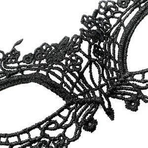 Macro shot highlighting the intricate details of black water-soluble lace fabric