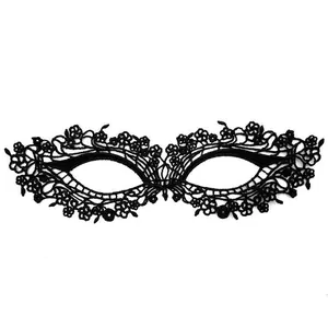 Detail shot of a black water-soluble lace masquerade mask with hollowed floral design
