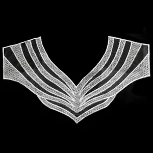 Detailed view of white water-soluble lace embroidered detachable collar applique