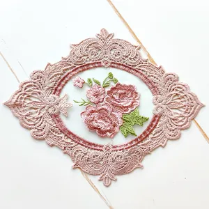 Detailed view of pink rose floral embroidery patch with delicate lace trim