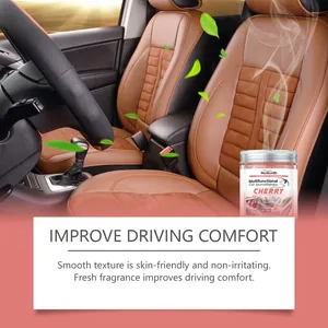 Homonth cherry fragrance car aromatherapy gel jar displayed inside a luxury car interior