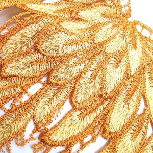 Macro detail of dual-color water soluble lace embroidered collar piece