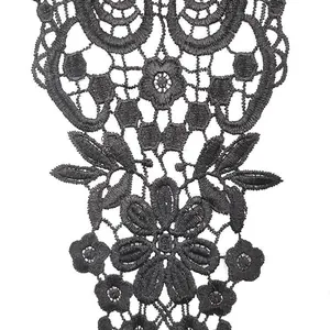 Macro shot showing the delicate floral pattern and texture of black water-soluble lace