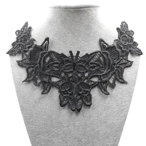 Detailed macro view of black butterfly lace embroidery applique for DIY craft sewing