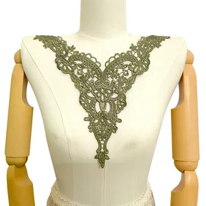 Detailed view of the olive green water-soluble lace neckline patch for DIY sewing projects.