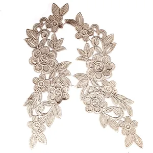 Detailed macro shot of elegant champagne floral water-soluble lace embroidery appliques