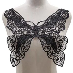 Detailed close-up view of black lace butterfly embroidered applique collar on a dress form