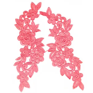 Detailed view of pink floral water-soluble lace embroidery patches for DIY sewing