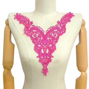 Close-up of hot pink water-soluble lace floral embroidery neckline appliqué on a mannequin
