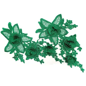 Close-up detail of dark green 3D water-soluble floral embroidery lace applique patch