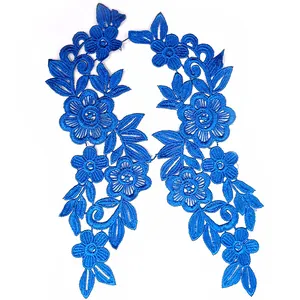 Macro view of blue water-soluble floral embroidery lace patches for DIY clothing decor