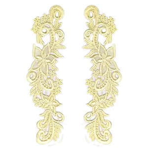 Detailed view of elegant gold water-soluble lace floral appliques for DIY sewing crafts