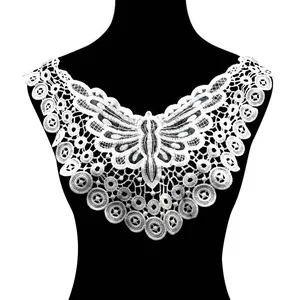 Detail showing the intricate white butterfly embroidery on this water-soluble lace collar
