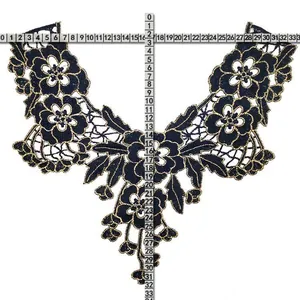 Detail view of black and gold embroidered lace collar with size measurements in centimeters