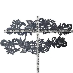 Close-up measurement view showing dimensions of black water-soluble lace embroidery appliques
