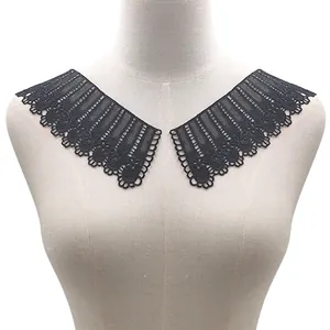 Detailed view of black water-soluble lace collar with intricate milk silk embroidery texture