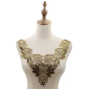 Detail of vintage gold 3D floral water-soluble lace embroidered collar patch on mannequin