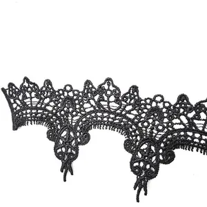 Close-up detail of black water-soluble lace embroidery applique