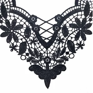 Close-up detail of black water-soluble lace floral embroidery applique for DIY sewing