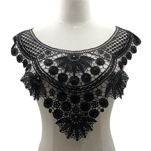 Detail of black water-soluble lace floral embroidery collar with hollow design